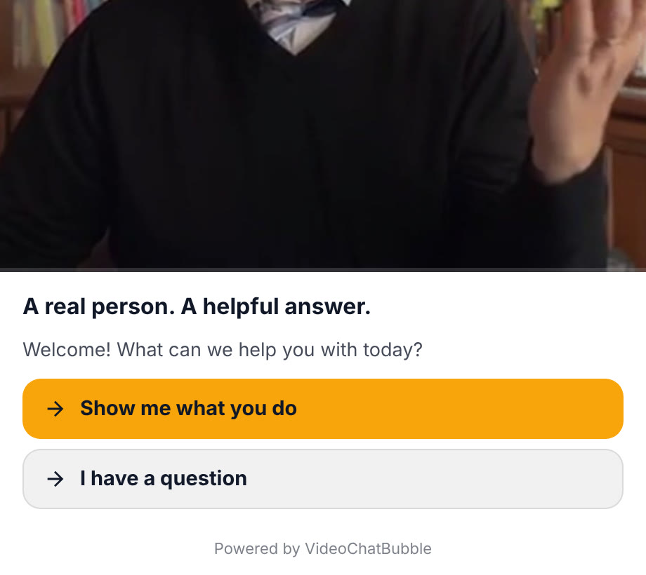 The open bubble: a welcome video with two buttons, Show me what you do and I have a question